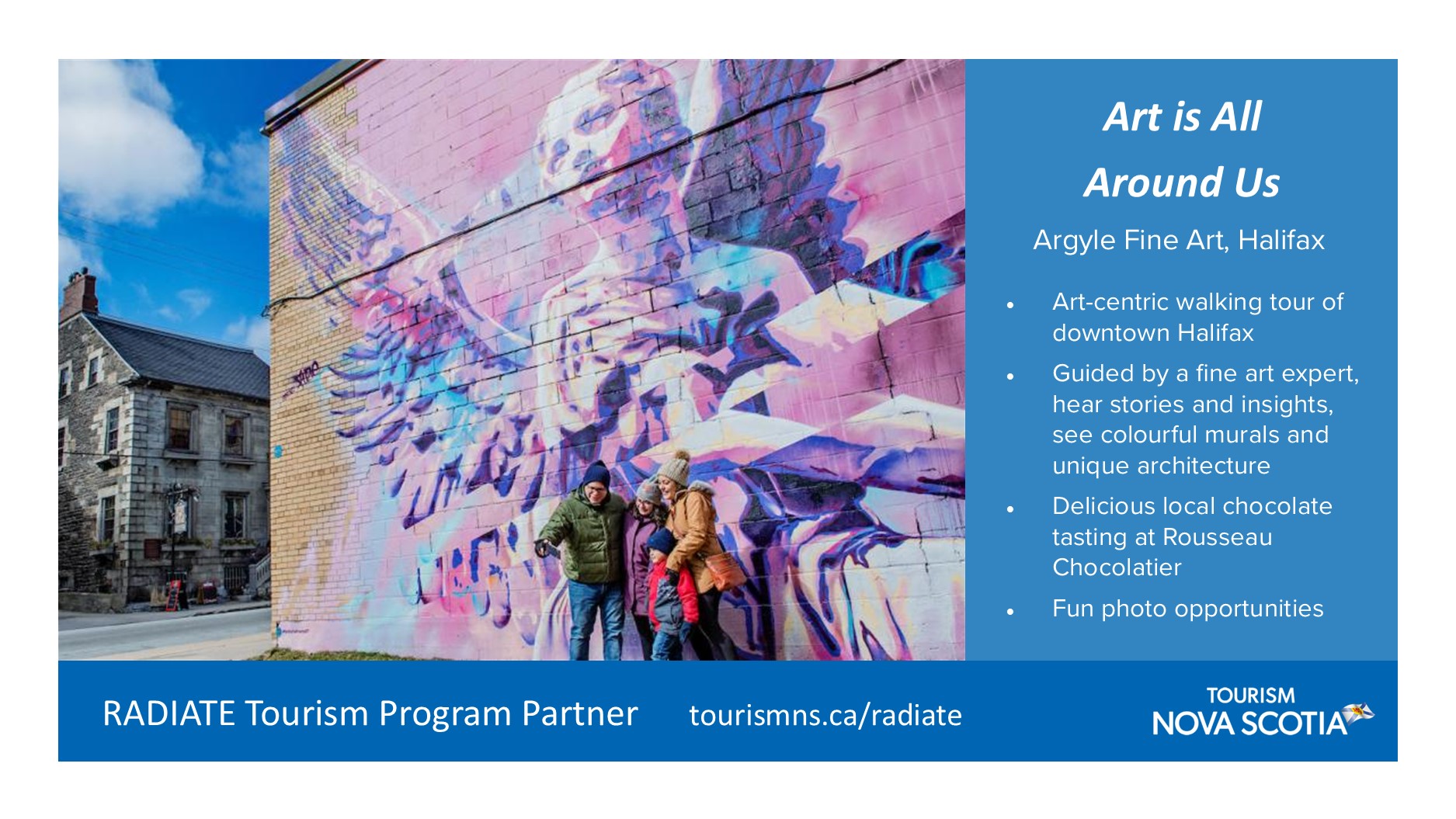 Image of a family in front of a mural in Halifax. 