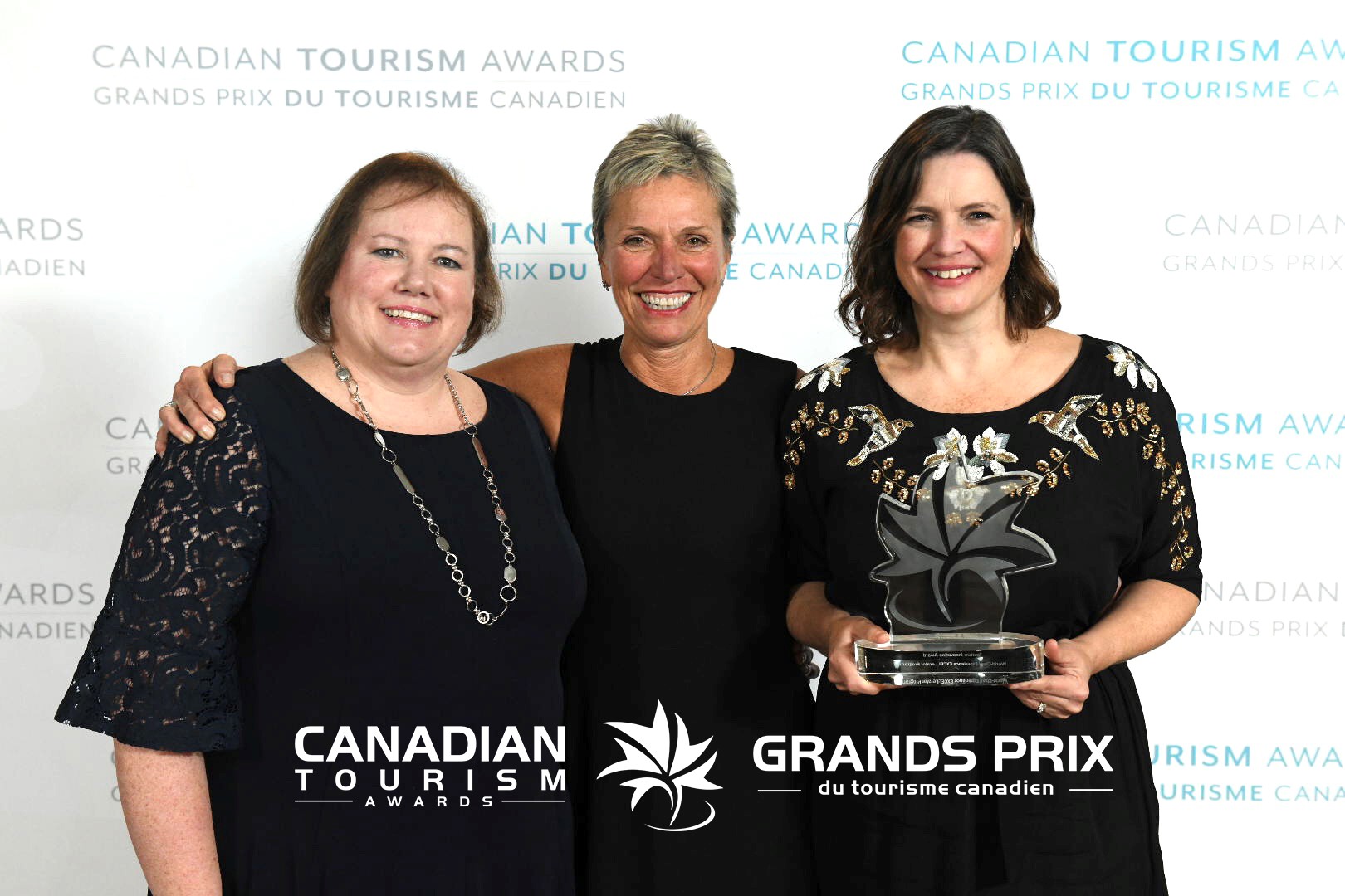 Darlene MacDonald and Heather Yule accept the Tourism Innovation Award at the Canadian Tourism Awards