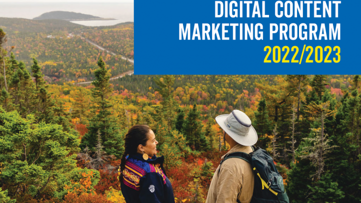 Two people stand on a precipice looking out over the Cape Breton Highlands in the fall. Text reads: Digital Content Marketing Program 2022-23