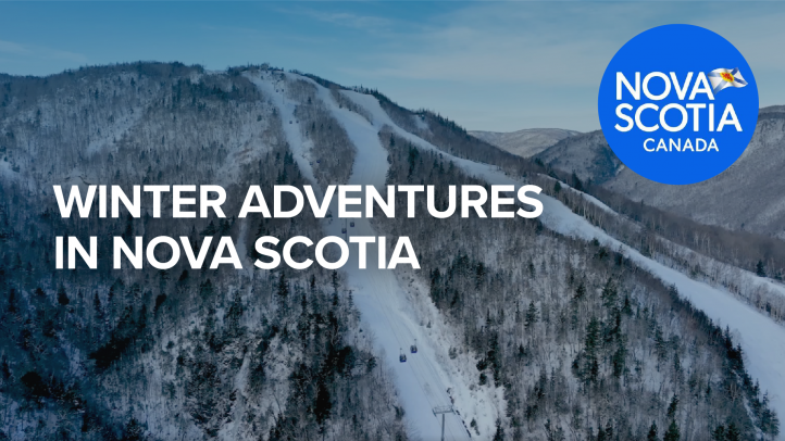 Cover image for Nova Scotia's winter tourism campaign. Image shows people skiing at Cape Smokey with text overlay that says Winter Adventures in Nova Scotia.