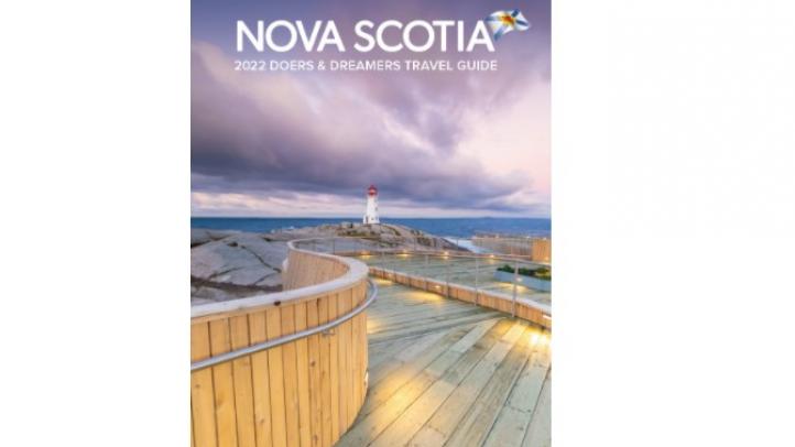 Cover of 2022 Doers and Dreamers travel guide featuring Peggy's Cove viewing platform.
