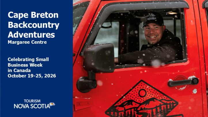 Mac, owner of Cape Breton Backcountry Adventures, smile from the driver's side window of his jeep. 