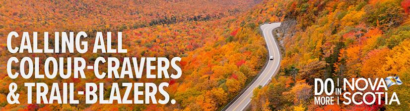 Digital billboard ad showing vibrant fall foliage on the Cabot Trail. Text reads: Calling all colour-cravers and trail-blazers.