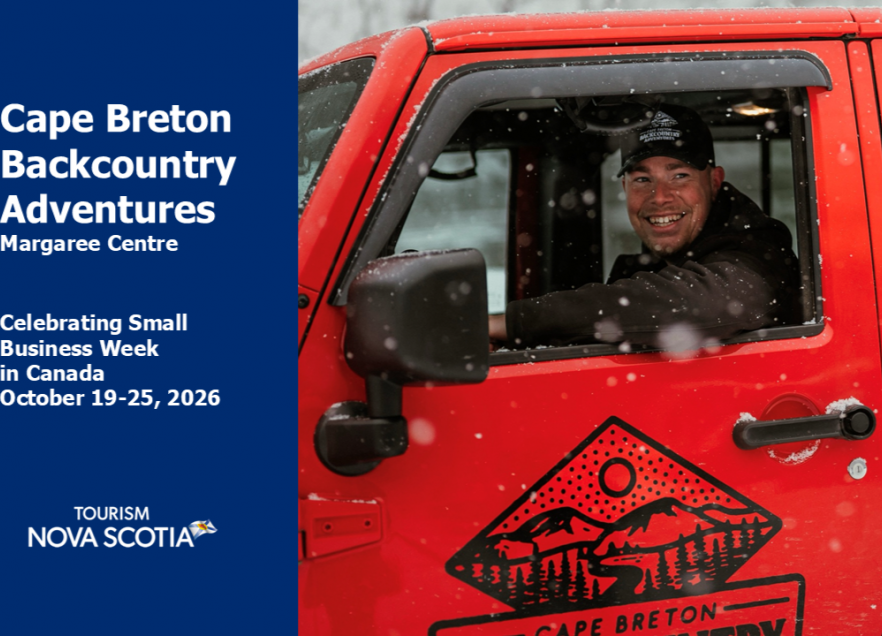 Mac, owner of Cape Breton Backcountry Adventures, smile from the driver's side window of his jeep. 
